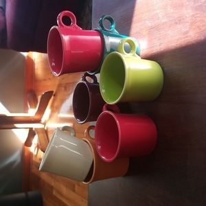 Seven (7) Fiestaware mugs